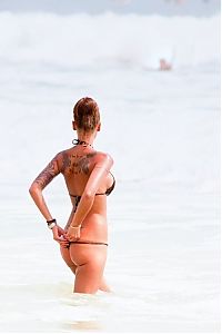 TopRq.com search results: tattoo girl on the beach in the sea