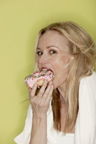 girl eating doughnut
