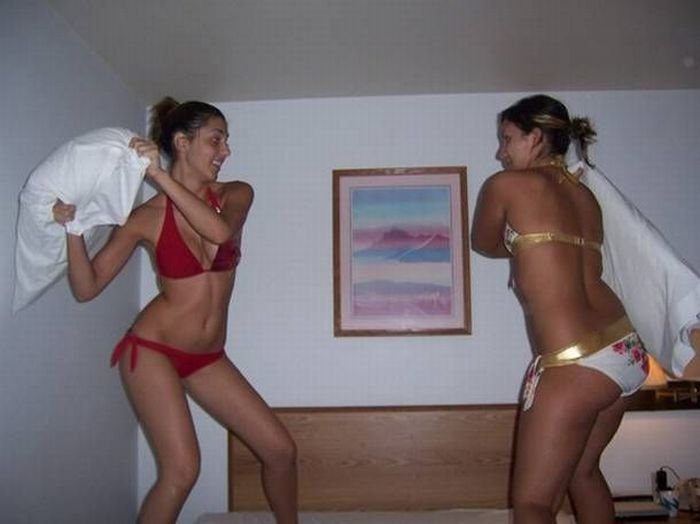 girls fighting with pillows