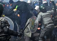 People & Humanity: Protesters clashes against Silvio Berlusconi, Rome, Italy