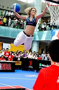 Sport and Fitness: NBA girl making a slam dunk