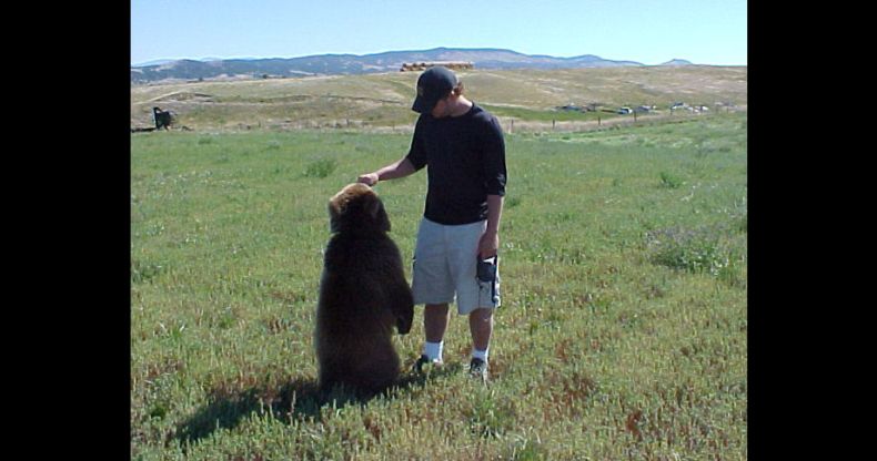 Biologist Casey Anderson, and his bear Butusov