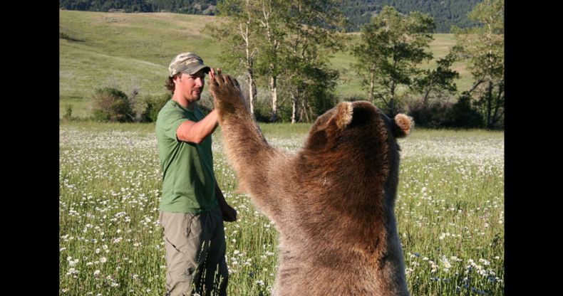 Biologist Casey Anderson, and his bear Butusov