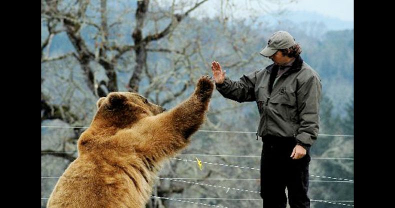 Biologist Casey Anderson, and his bear Butusov