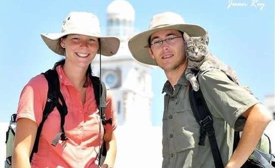 guy traveling with a cat