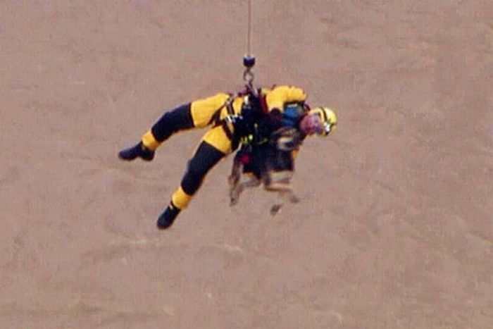 dog being rescued by helicopter