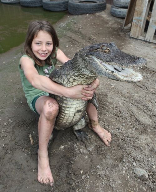 Samantha Young, a 9-year-old alligator wrestler