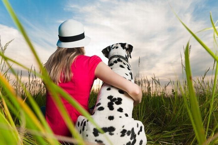 young woman with her dog pet