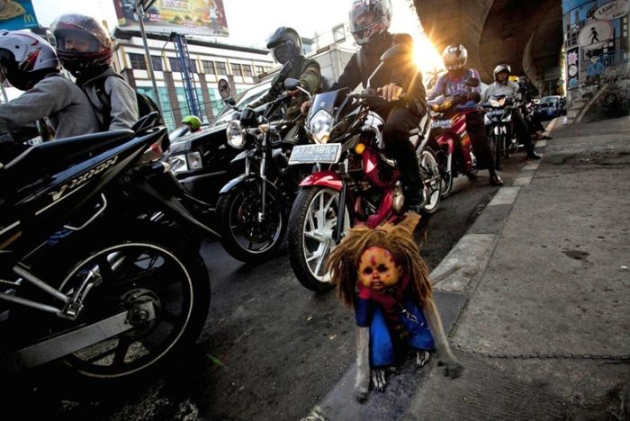 Monkey performs on the street, Indonesia