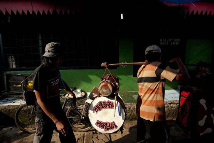 Monkey performs on the street, Indonesia