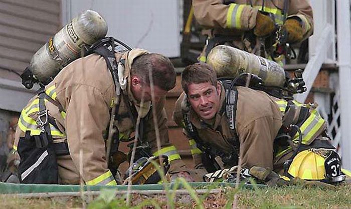 Firefighters resuscitate a dog by mouth-to-snout insufflation, Wasau, Wisconsin, United States