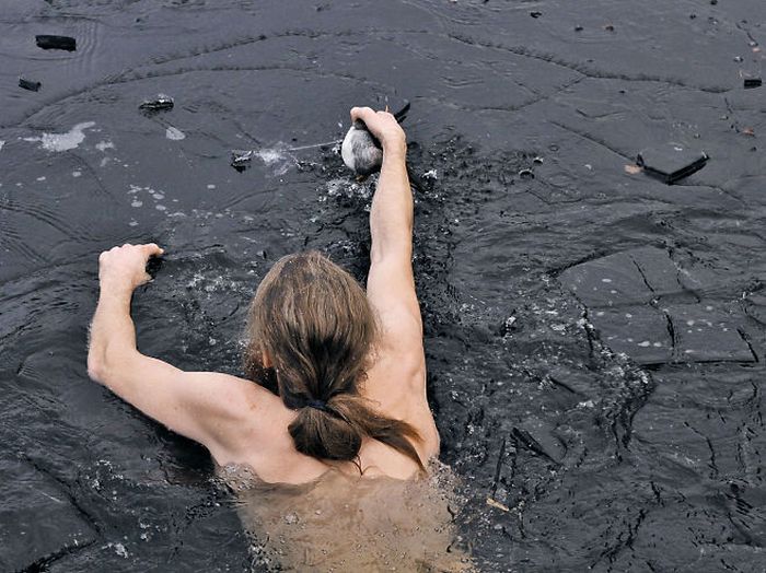 saving duck from a frozen lake