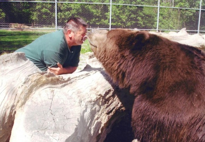 man living with orphaned bears