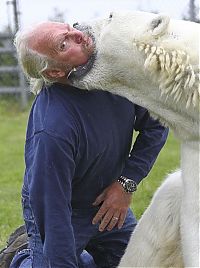 Fauna & Flora: man with a polar bear