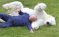 Fauna & Flora: man with a polar bear