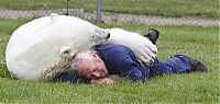 Fauna & Flora: man with a polar bear