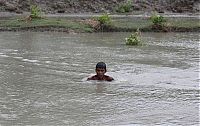 TopRq.com search results: Boy saves a baby fawn, Bangladesh