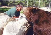 man living with orphaned bears