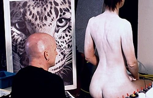 Body art girl with a leopard painting by Craig Tracy