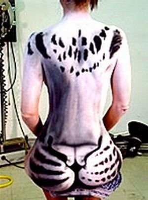 Body art girl with a leopard painting by Craig Tracy