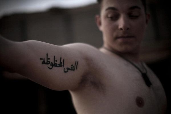 U.S. Marines Show Their Tattoos in Afghanistan by Mauricio Lima