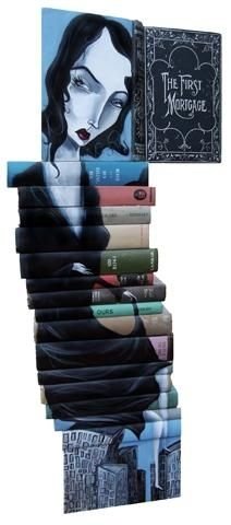 artwork on spines of stacked books