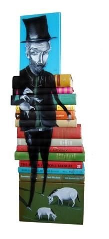 artwork on spines of stacked books