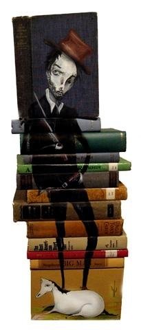 artwork on spines of stacked books