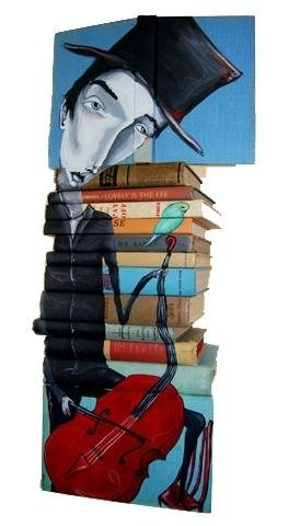artwork on spines of stacked books