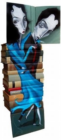 artwork on spines of stacked books