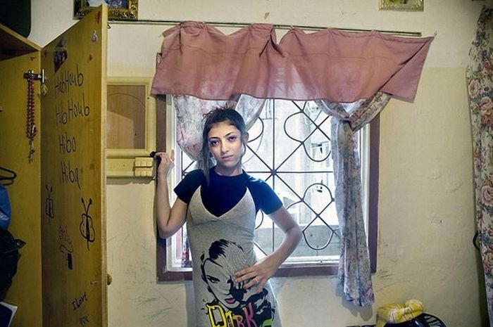 Girls and their rooms by Rania Matar