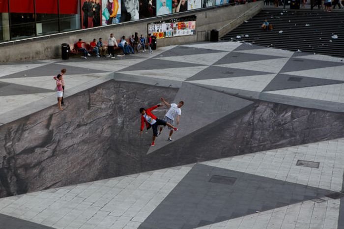 Mind your step illusion by Erik Johansson, Sergel's Square, Stockholm, Sweden