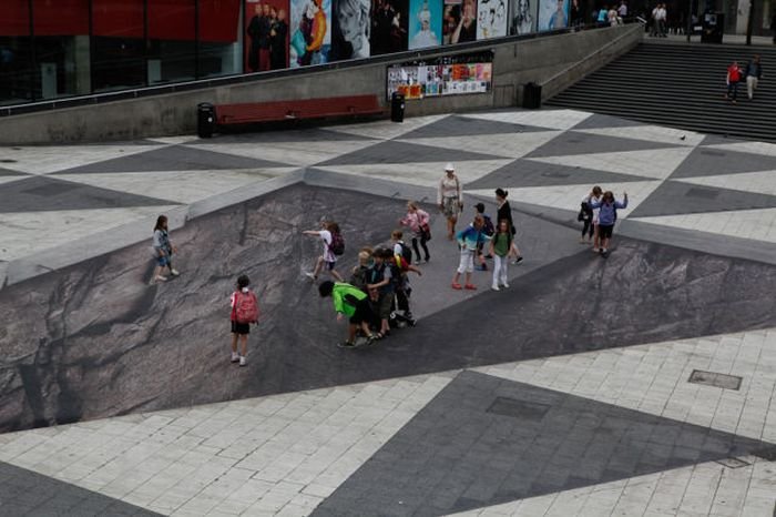 Mind your step illusion by Erik Johansson, Sergel's Square, Stockholm, Sweden