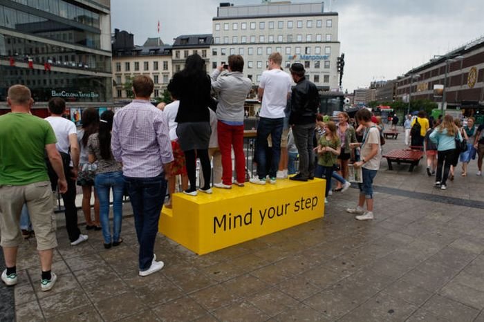 Mind your step illusion by Erik Johansson, Sergel's Square, Stockholm, Sweden