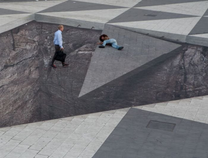 Mind your step illusion by Erik Johansson, Sergel's Square, Stockholm, Sweden