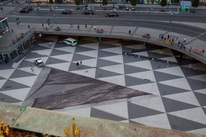 Mind your step illusion by Erik Johansson, Sergel's Square, Stockholm, Sweden