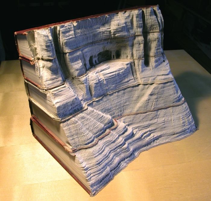 Book carvings projects by Guy Laramée