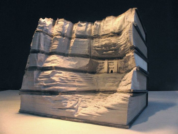 Book carvings projects by Guy Laramée