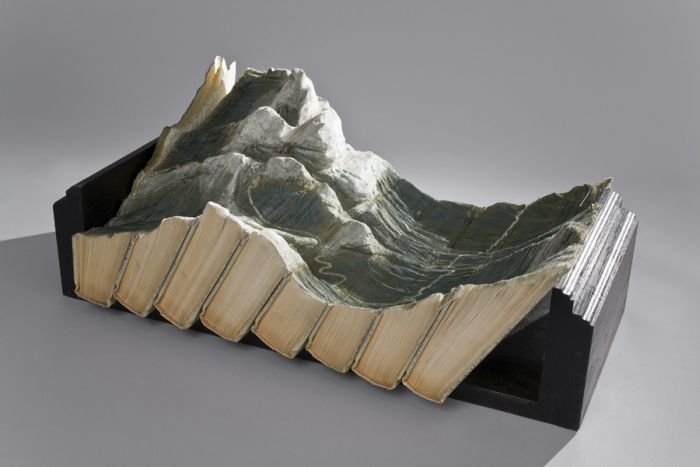 Book carvings projects by Guy Laramée