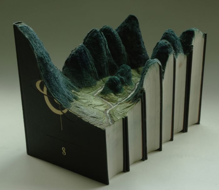 Book carvings projects by Guy Laramée