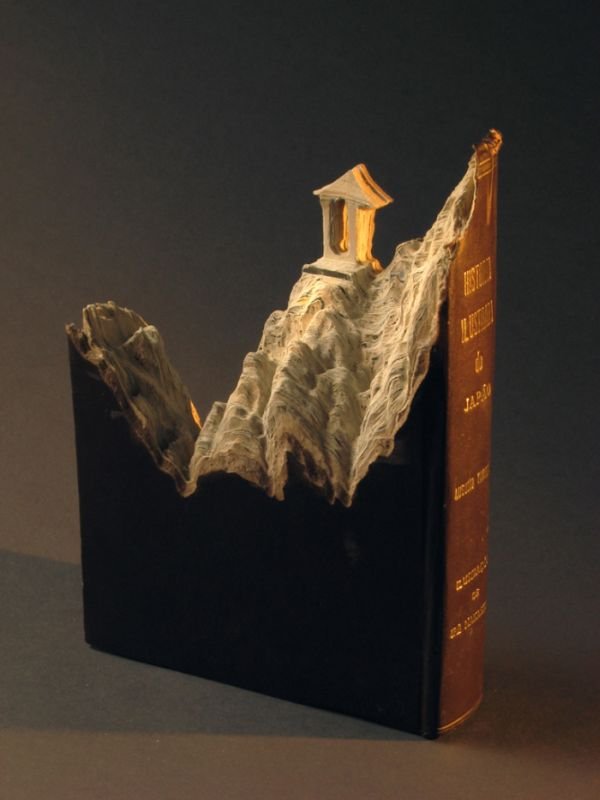 Book carvings projects by Guy Laramée