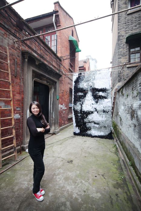 portrait made of socks, bamboo sticks and pins