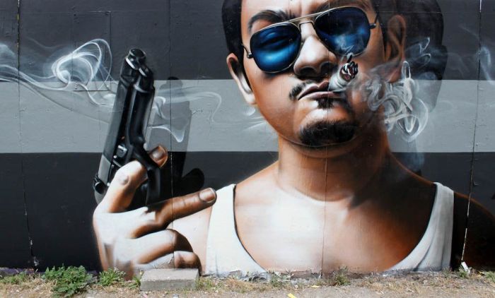 Street art graffiti by Smug One