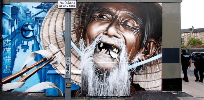Street art graffiti by Smug One