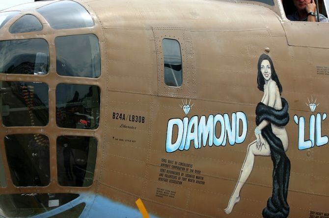 nose art painting of a military aircraft