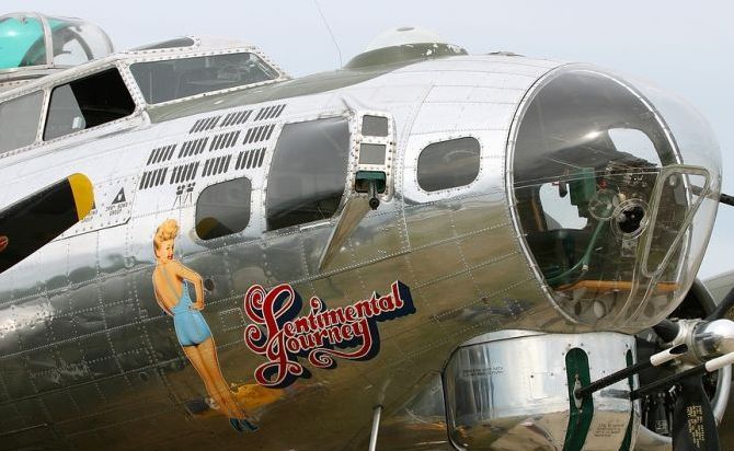 nose art painting of a military aircraft