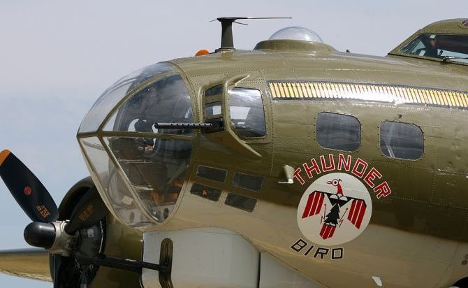 nose art painting of a military aircraft