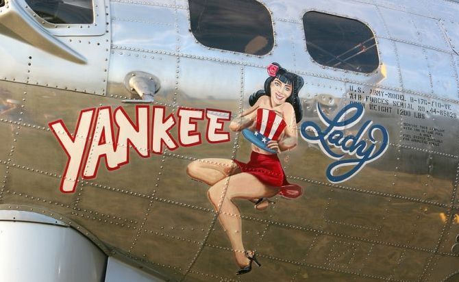 nose art painting of a military aircraft