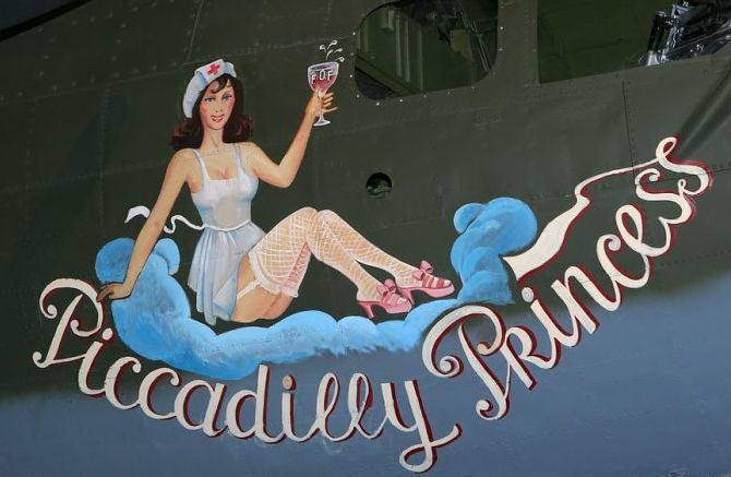 nose art painting of a military aircraft