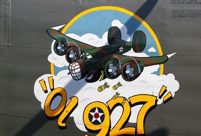 nose art painting of a military aircraft